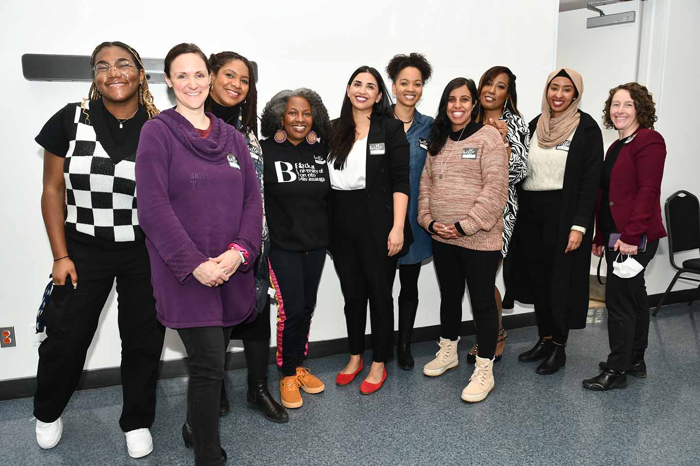 Members of the Black at UTM leadership team, standing and smiling at the camera at the Black at UTM launch event