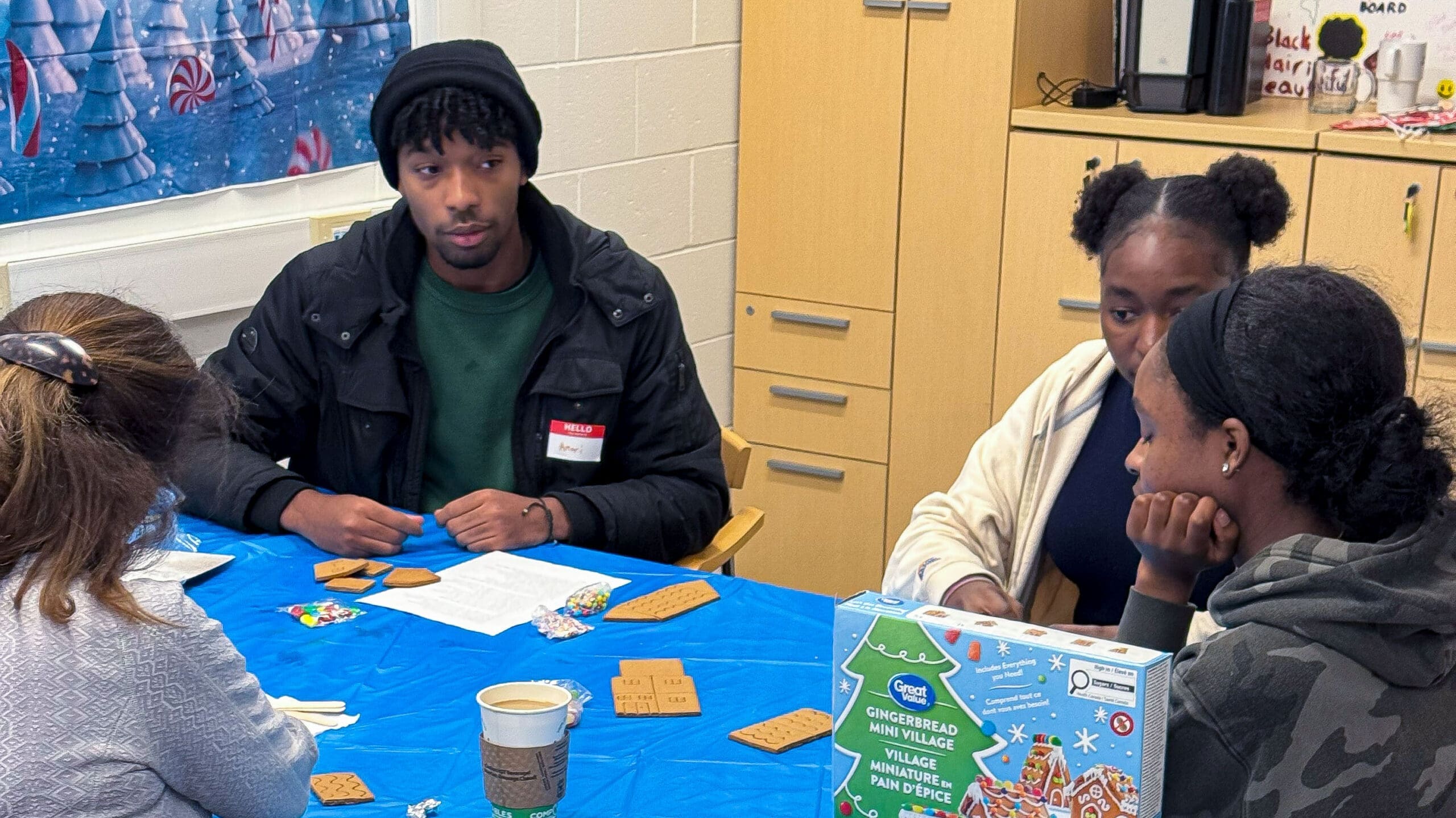 cbeb-image-3 A group of students sitting in the CBEB decorating cookies