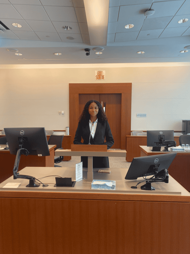 Christine Erhirhie preparing to deliver her oral argument.